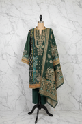 Emerald green embroidered three-piece suit on marble background