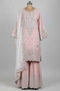 Light pink gharara suit with silver embroidery on mannequin