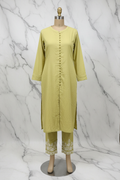 Lime green kurta set on marble background