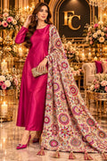 Pink medallion print shawl with tassels, worn