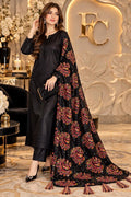 Black paisley print shawl with tassels, worn