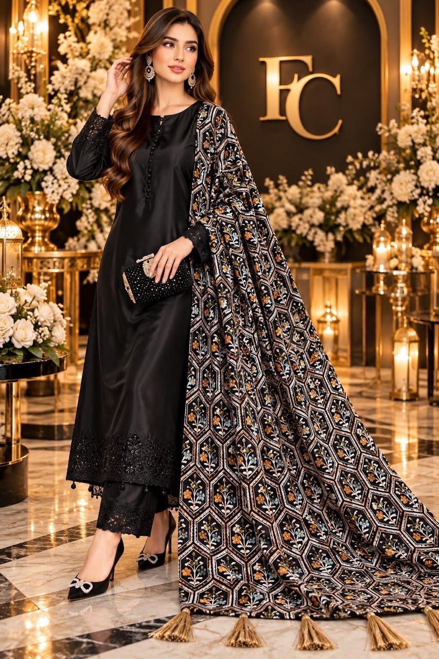 Black and gold geometric shawl with tassels, worn