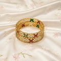 Gold enamel butterfly bangles, pair